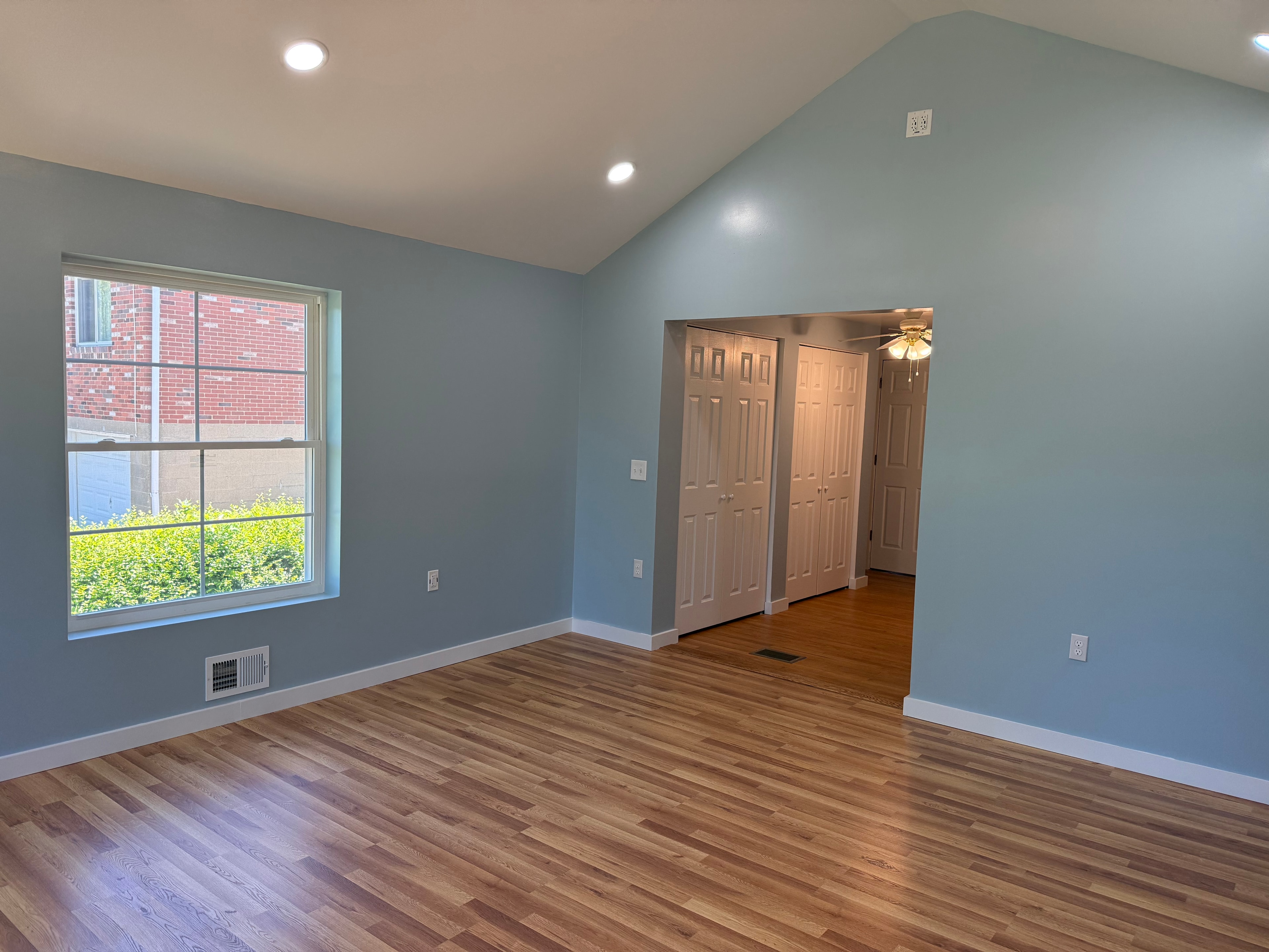 Interior bedroom remodel with blue walls
