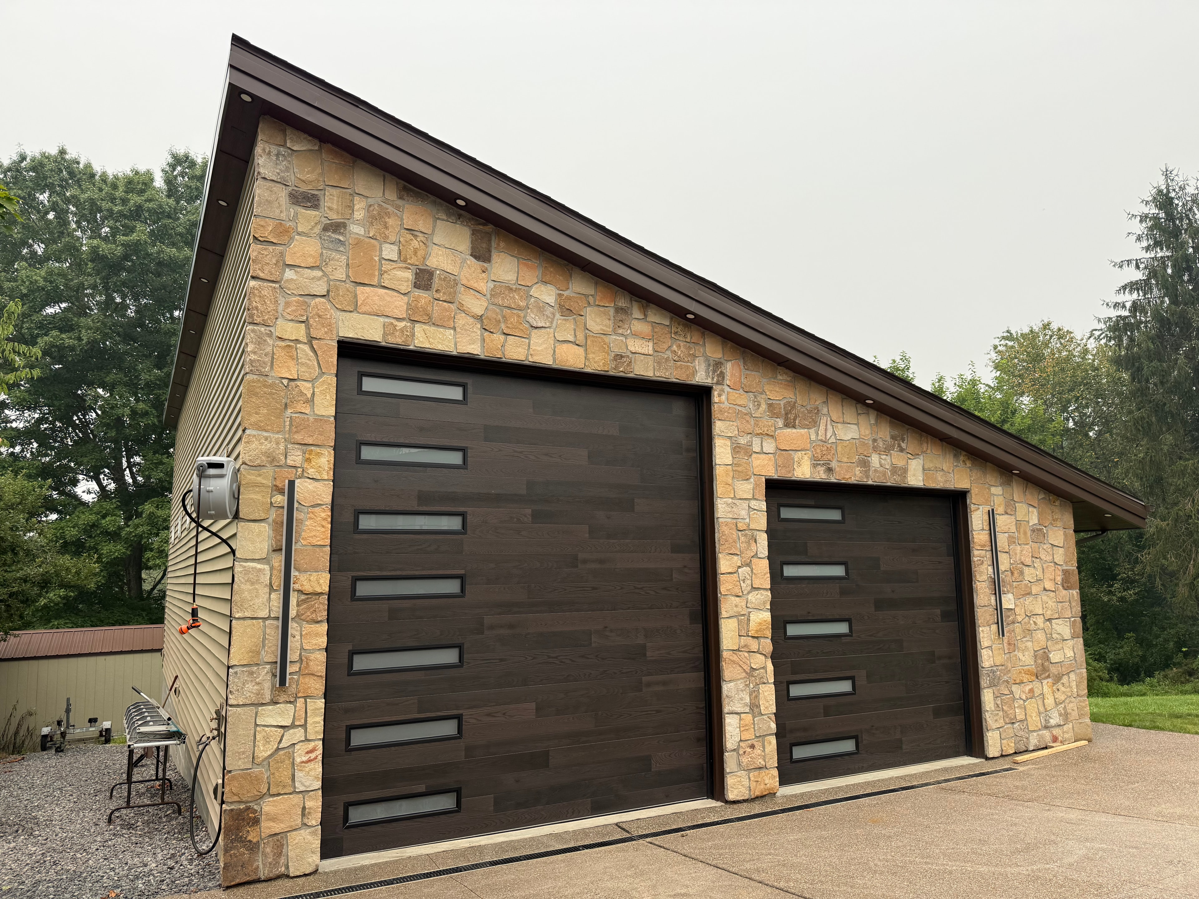 Stone and steel garage front